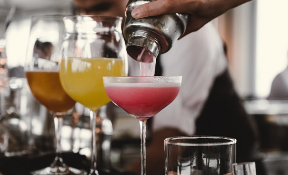 Pouring cocktails image